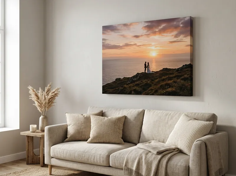 A canvas of the couple at sunset hanging above the sofa