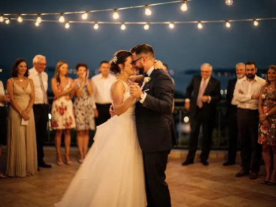 A photo book page: the couple’s first dance
